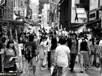 如何在街头摄影中不被拍摄对象注意